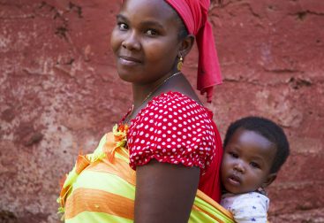 African woman with baby on back